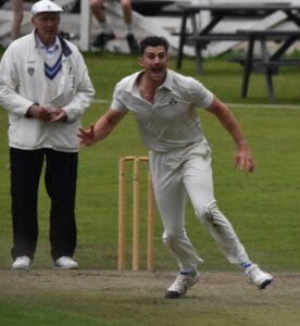Fraser Hay on his way to a five wicket haul.